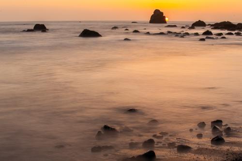 Boulder;Brown;California;Del Norte Coast Redwood State Park;Dusk;Geological;Geology;Ocean;Pink;Redwood National Park;Rock;Rock formations;Rocks;Sea;Stone;Stones;United States;Water;Waves;Wilson Creek Beach;blue;close of day;evening;eventide;gray;last Light;orange;reflection;reflections;sky;striation;sun;sunset